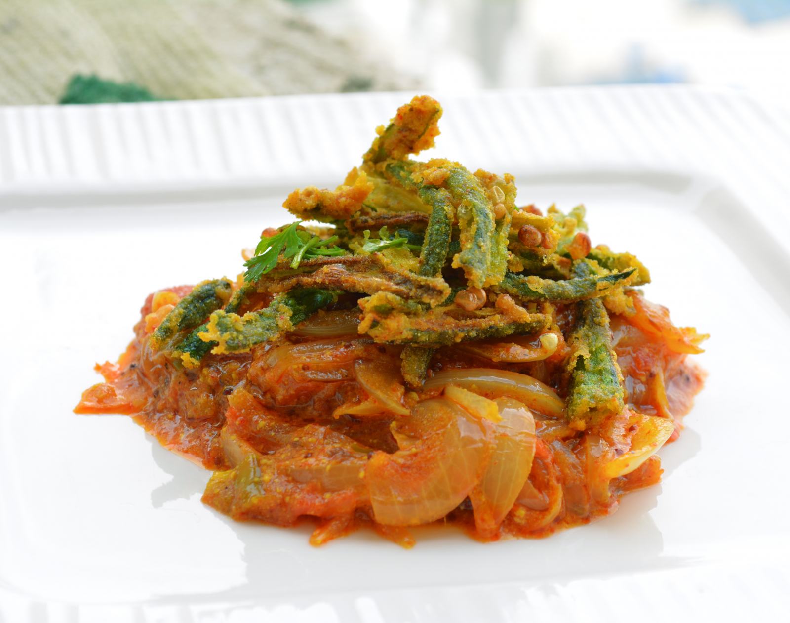 Kurkuri Bhindi With Spicy Tomato Yogurt Gravy Recipe