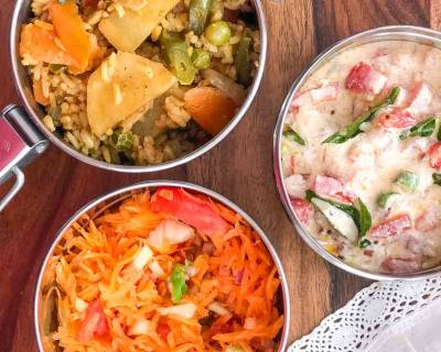 Lunch Box Ideas: Aloo Sabz Dum Biryani, Tomato Onion Tadka Raita And Salad
