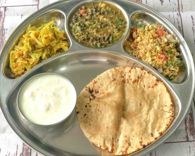 Portion Control Meal Plate: Green Moong Dal Makhani, Methi Sprouts salad, Cabbage Chana Dal Sabzi, Phulka & Curd
