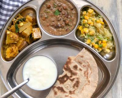 Portion Control Meal Plate: Malvani Kala Chana Masala, Bhoplya Cha Bharit, Phulka, Salad And Curd
