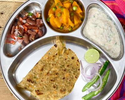 Portion Control Meal Plate : Aloo Gajar Matar Sabzi, Cabbage Carrot Paratha, Cucumber Raita And Rajma Salad
