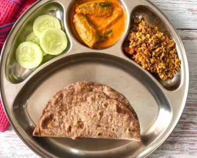 Portion Control Meal Plate- No Onion No Garlic Parwal Masala, Horse Gram Sprouts Thoran, Ragi Roti & Cucumbers