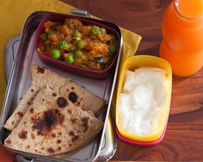 Kids Lunch Box :Matar Masala, Dashmi Roti, Curd & Carrot Juice