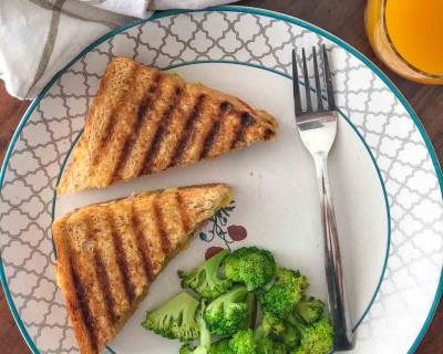 Breakfast Meal Plate : Grilled Potato Sandwich, Stir Fried Broccoli and Fresh Orange Juice