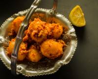 Chotti Aloor Dum Recipe - Baby Potatoes In Tomato Gravy