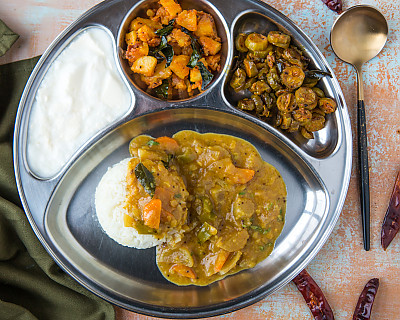 Portion Control Meal Plate: Urulai Kizhangu Roast, Konkani Tendli Sukke Recipe, Mixed Vegetable Sambar Recipe, Curd