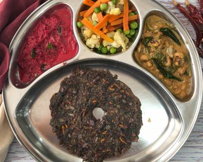 Portion Control Meal Plate: Ragi Roti, Palak Lobia Curry, Carrot Peas Sabzi, Beetroot Raita 
