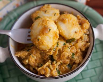 Malabar Style Kozhi Pidi Recipe - Rice Dumplings In Chicken Stew 