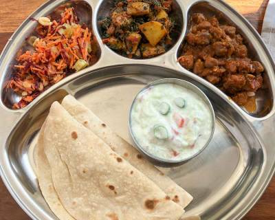 Portion Control Meal Plate : Chole Pindi, Aloo Methi Masala, Tomato Onion Raita, Carrot & Radish Salad and Phulka