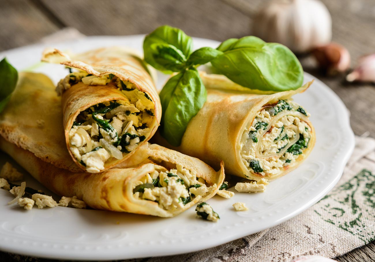 Spinach Ricotta filled Crepes with Pepper Cream Sauce