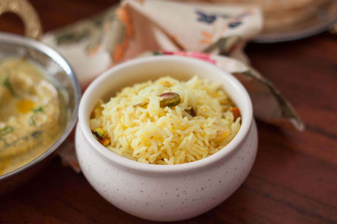 Bengali Holud Mishti Pulao Recipe - Saffron Flavored Rice With Nuts