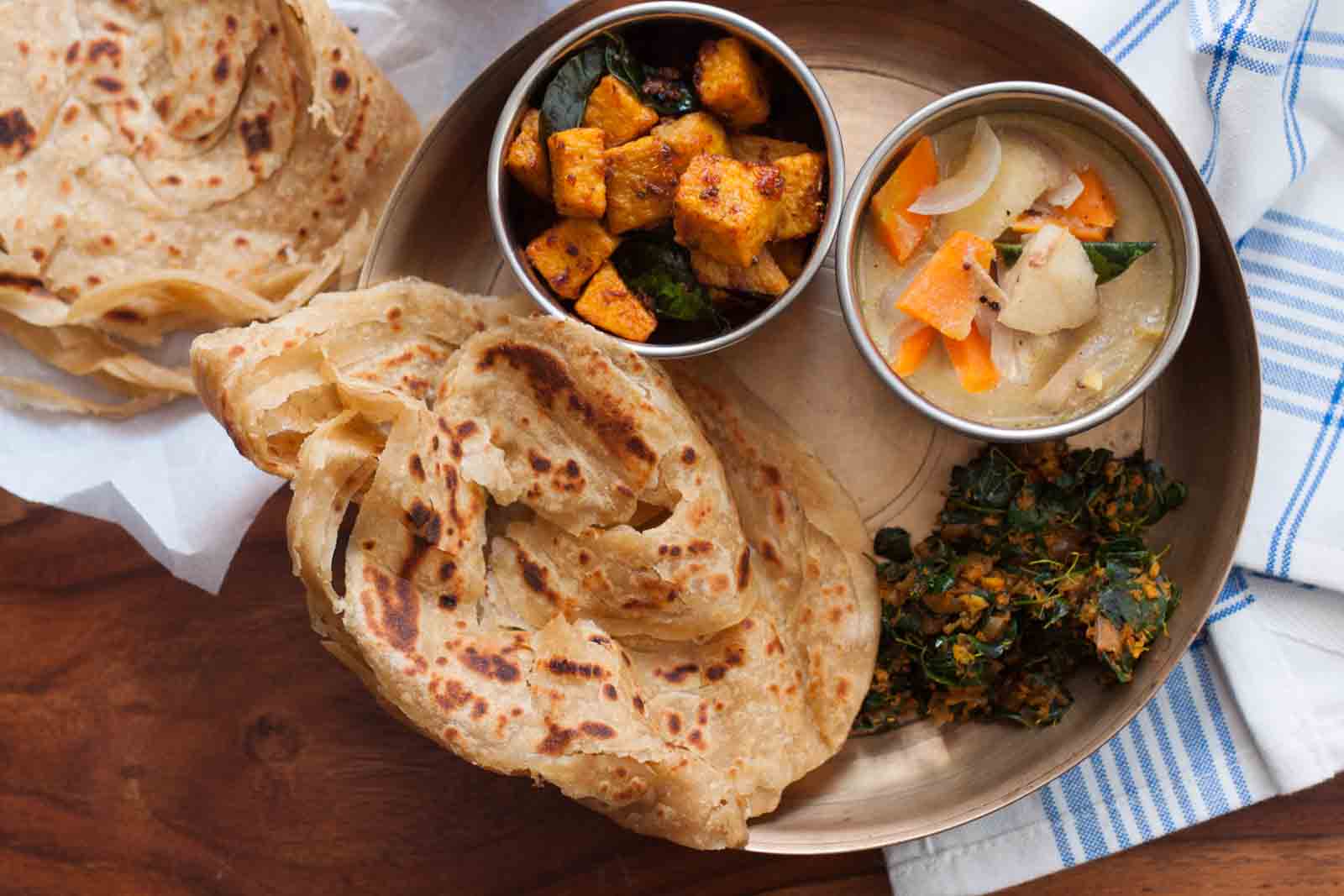 Everyday Meal Plate : Kerala Style Kappa Stew,Murungai Keerai Thoran,Yam Fry &amp; Parotta