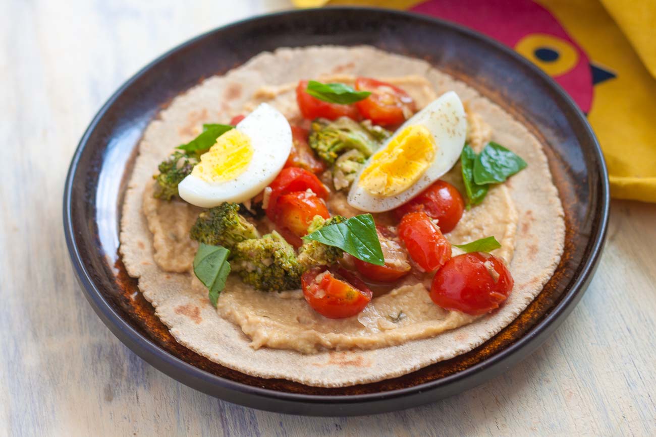 Soft Millet Taco Recipe Topped With Hummus & Veggies