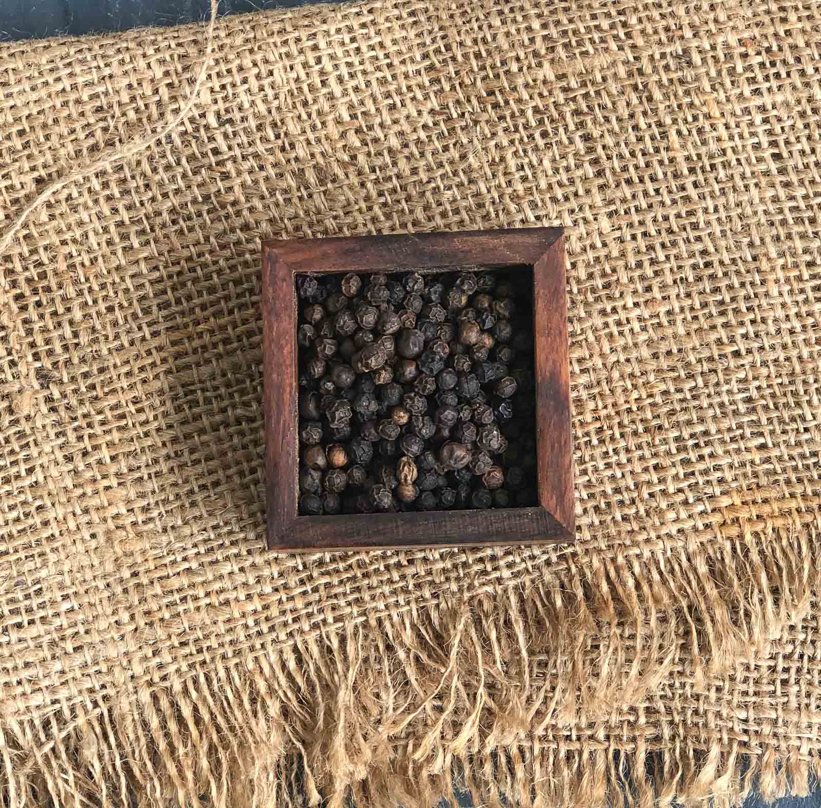 whole black pepper corns