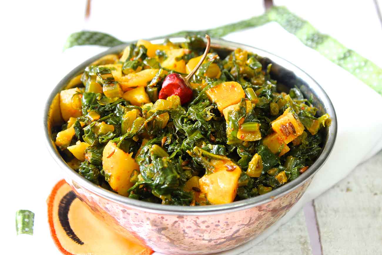 Aloo Aur Mooli Ke Patton Ki Sabzi Recipe - Radish Greens And Potato Stir Fry