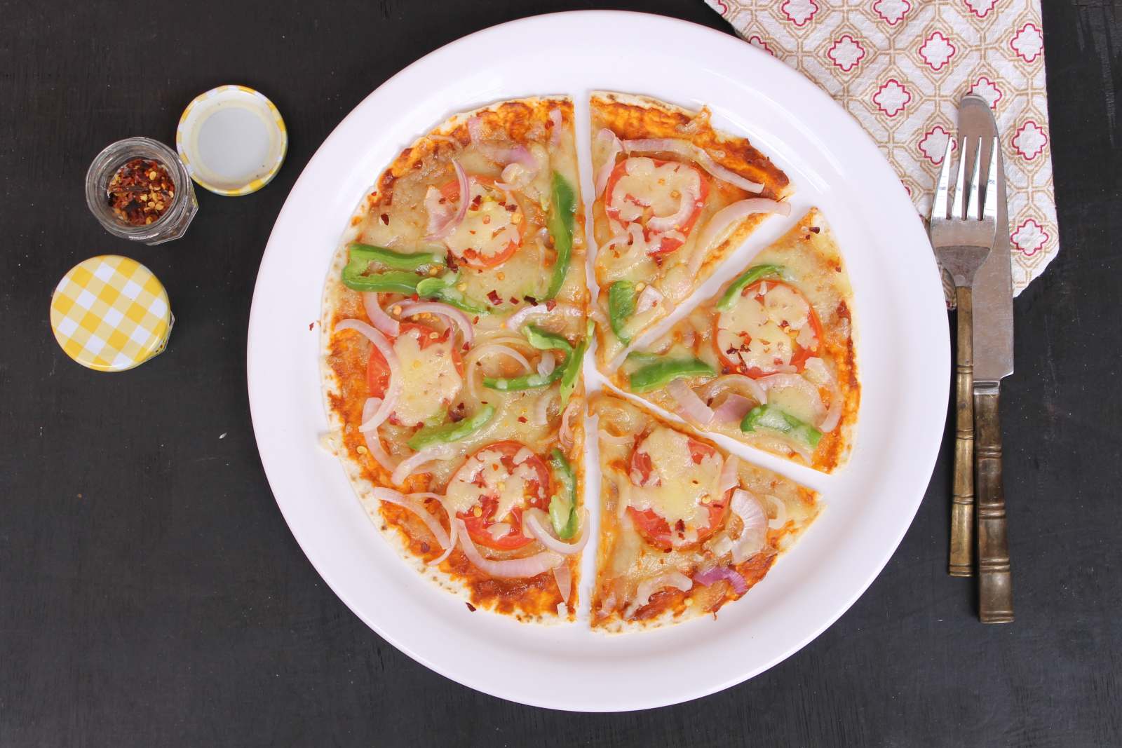 Tortilla Pizza With Tomato, Onion And Capsicum Recipe