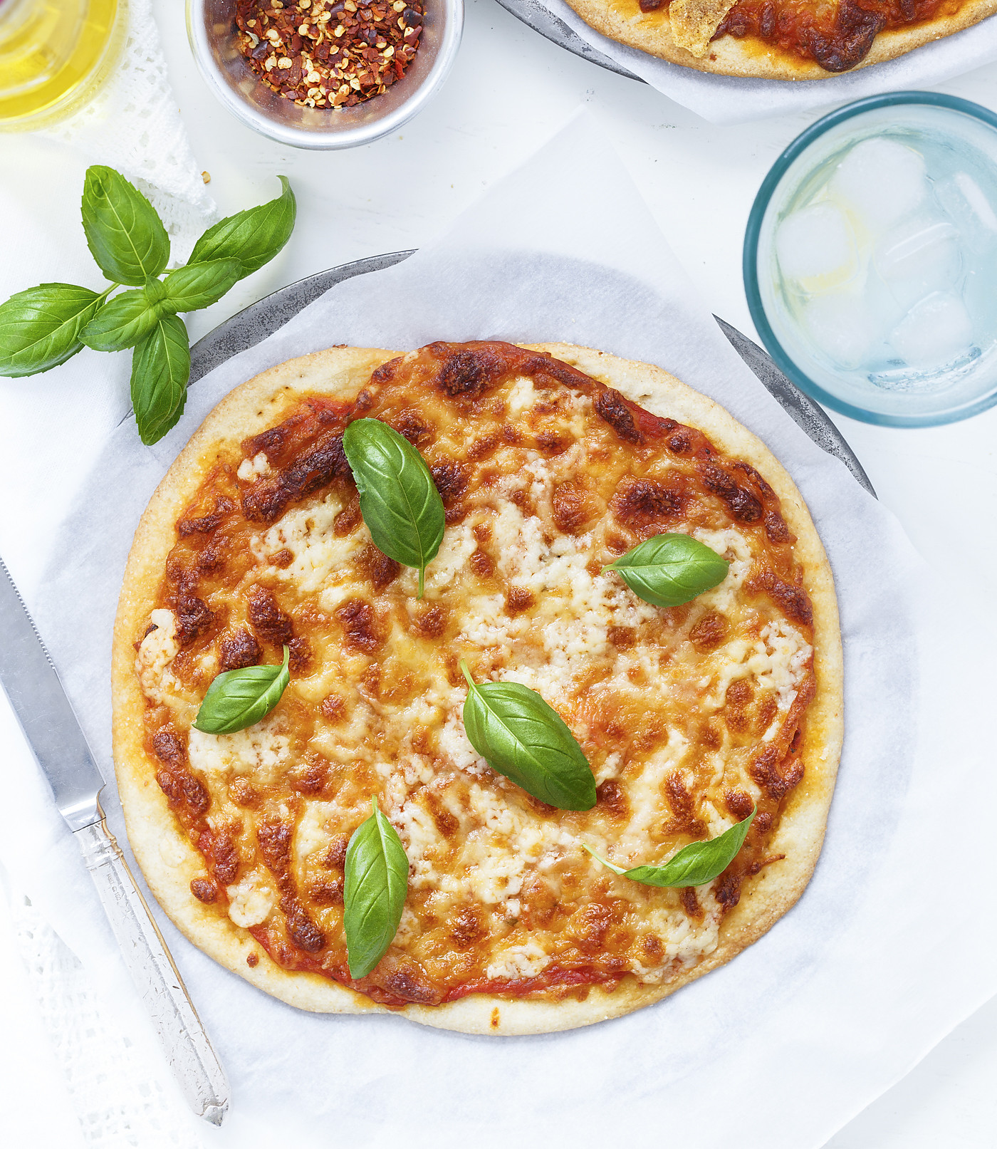 Classic Pizza Margherita Recipe - Pizza Topped With Cheese And Tomato Sauce