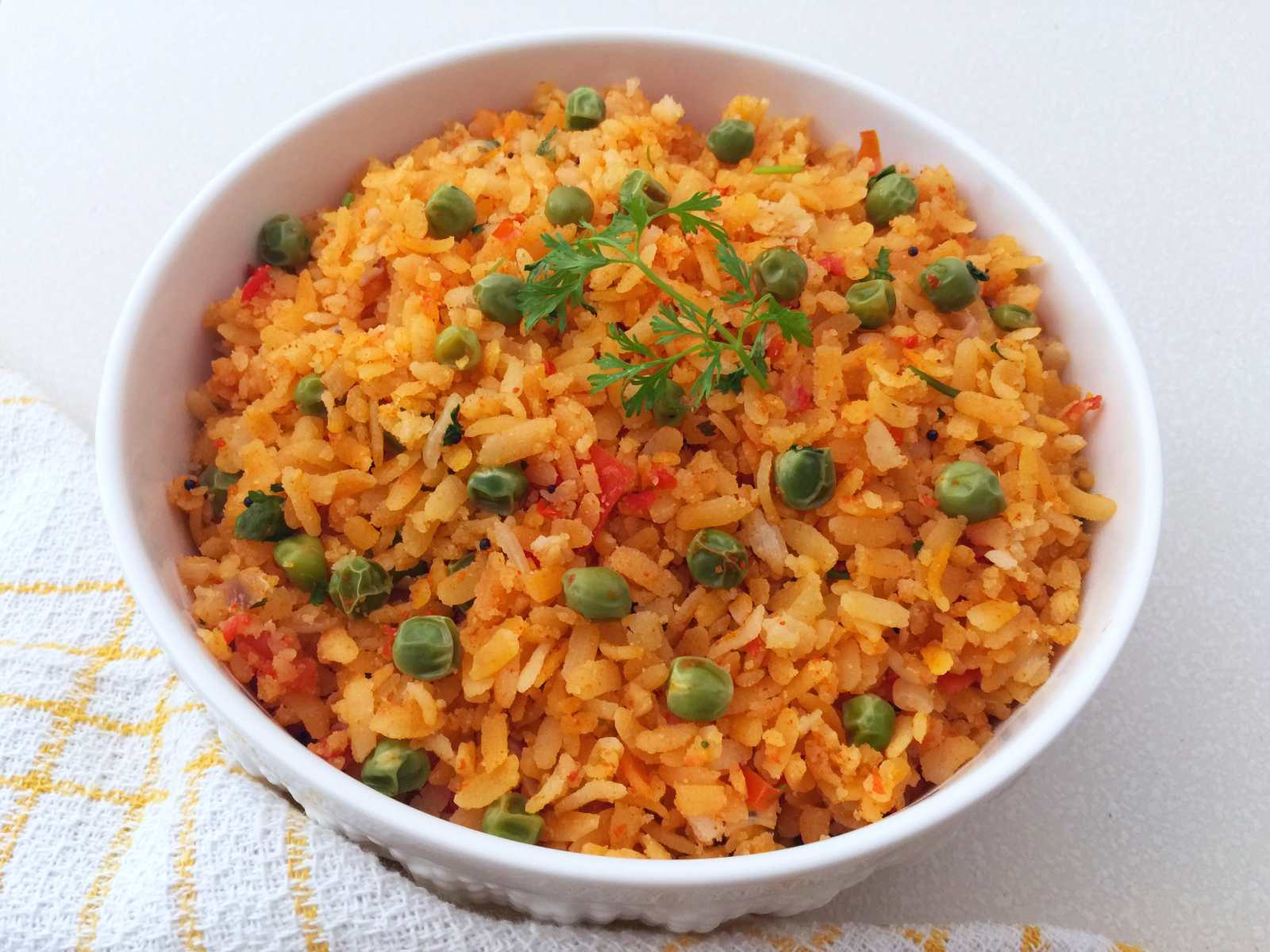 Tomato Poha With Peas Recipe