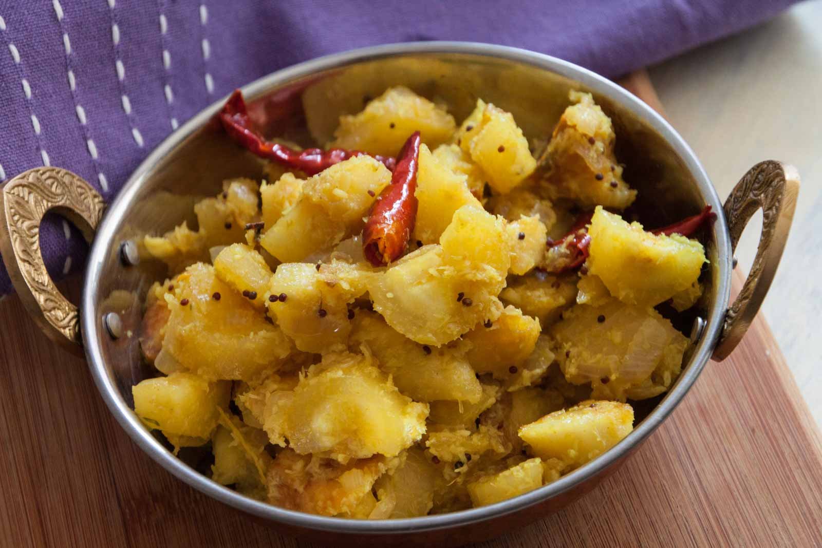 Kerala Style Kappa Ulathiyathu Recipe - Tapioca Stir Fry Recipe