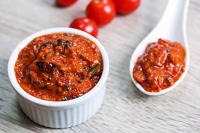 Spicy Tomato Pickle Recipe - South Indian Thakkali Thokku by Archana's Kitchen