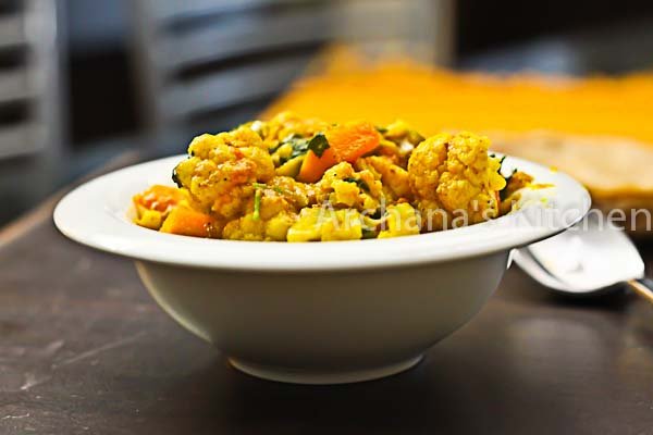 Cauliflower Curry With Bell Peppers And Carrots In Spiced Milk Gravy