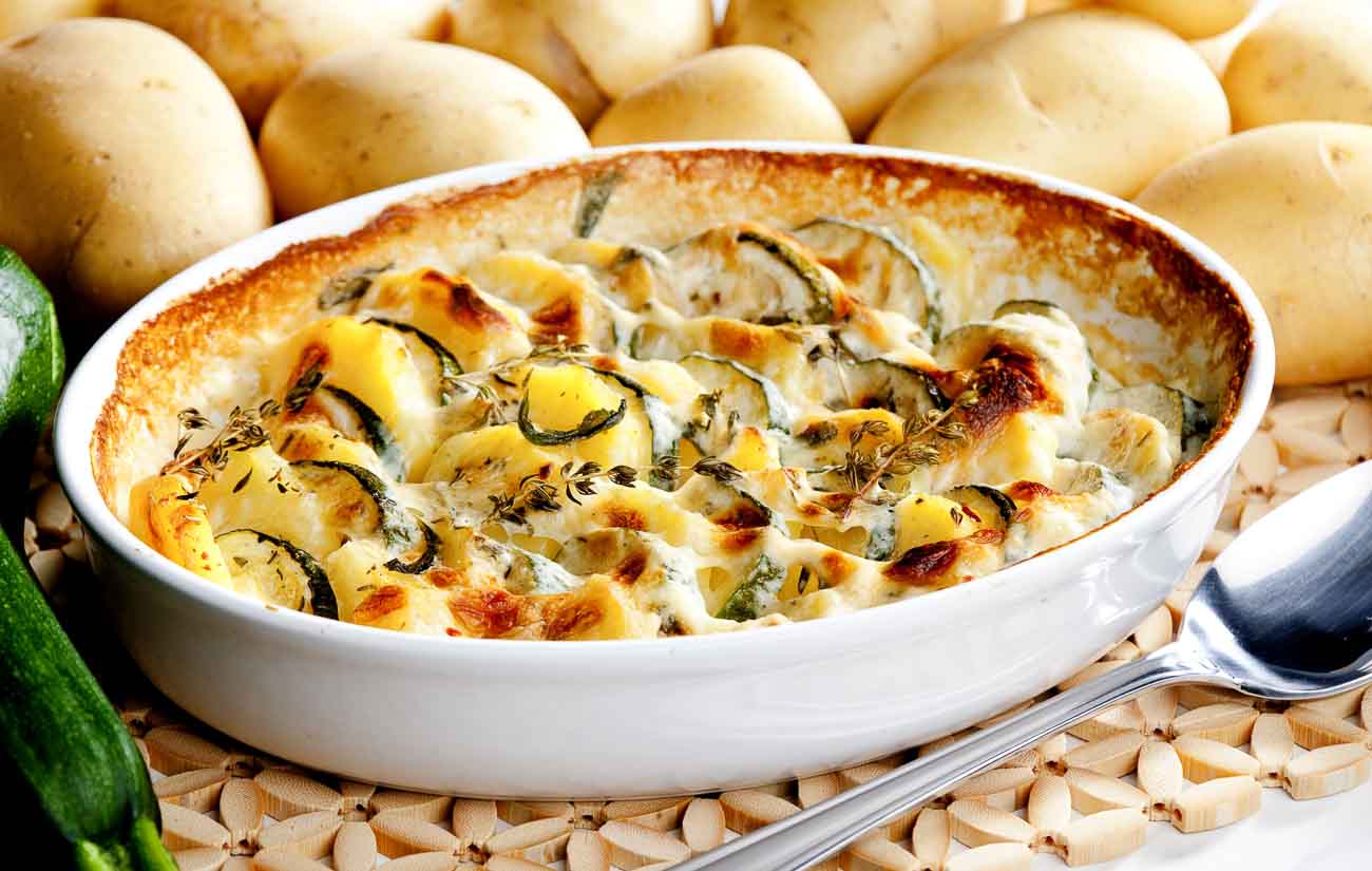 Roasted Potatoes & Zucchini Bake Recipe In A Creamy Parsley Sauce