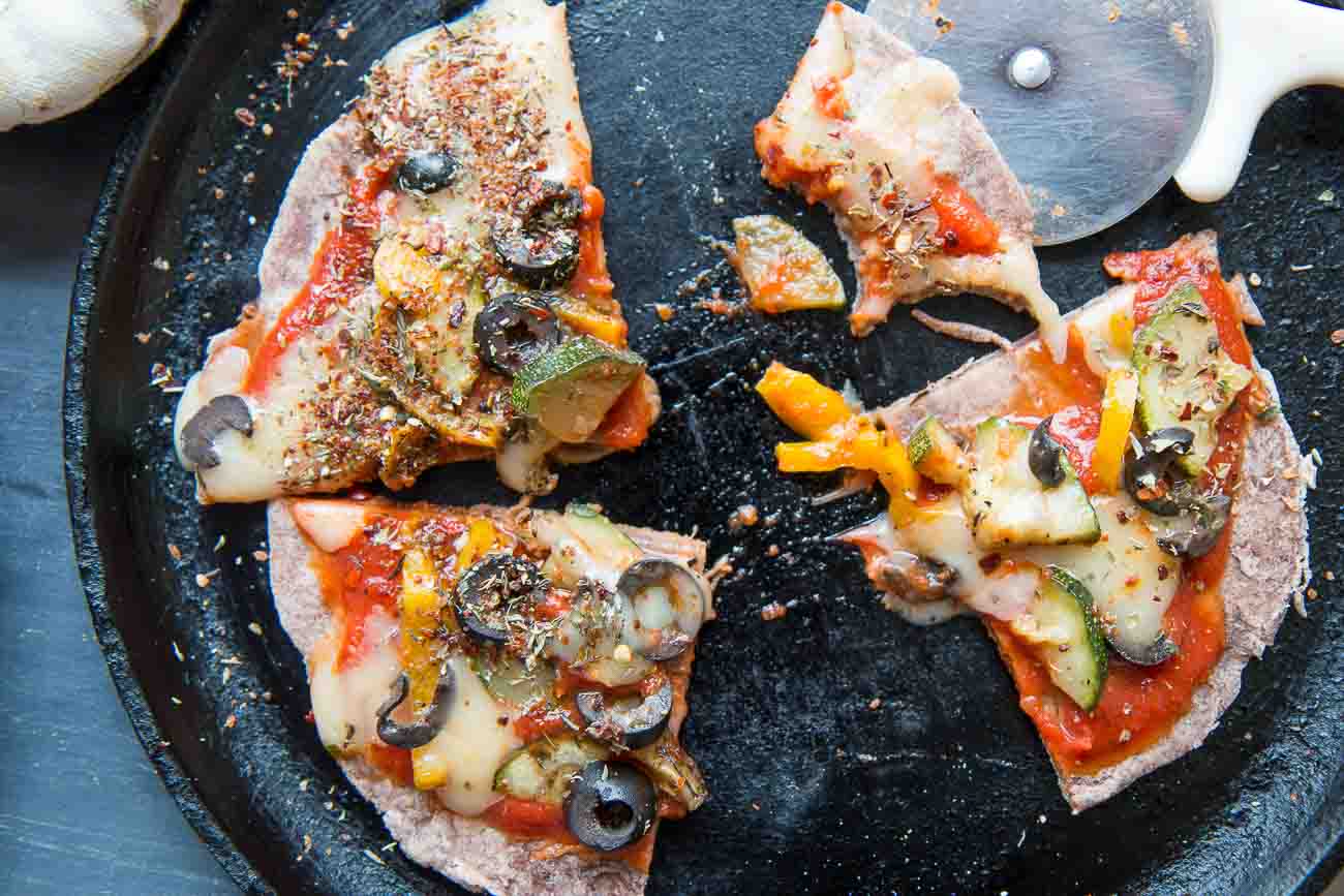 Whole Wheat & Ragi Crust Skillet Pizza Recipe Topped With Roasted Zucchini & Olives