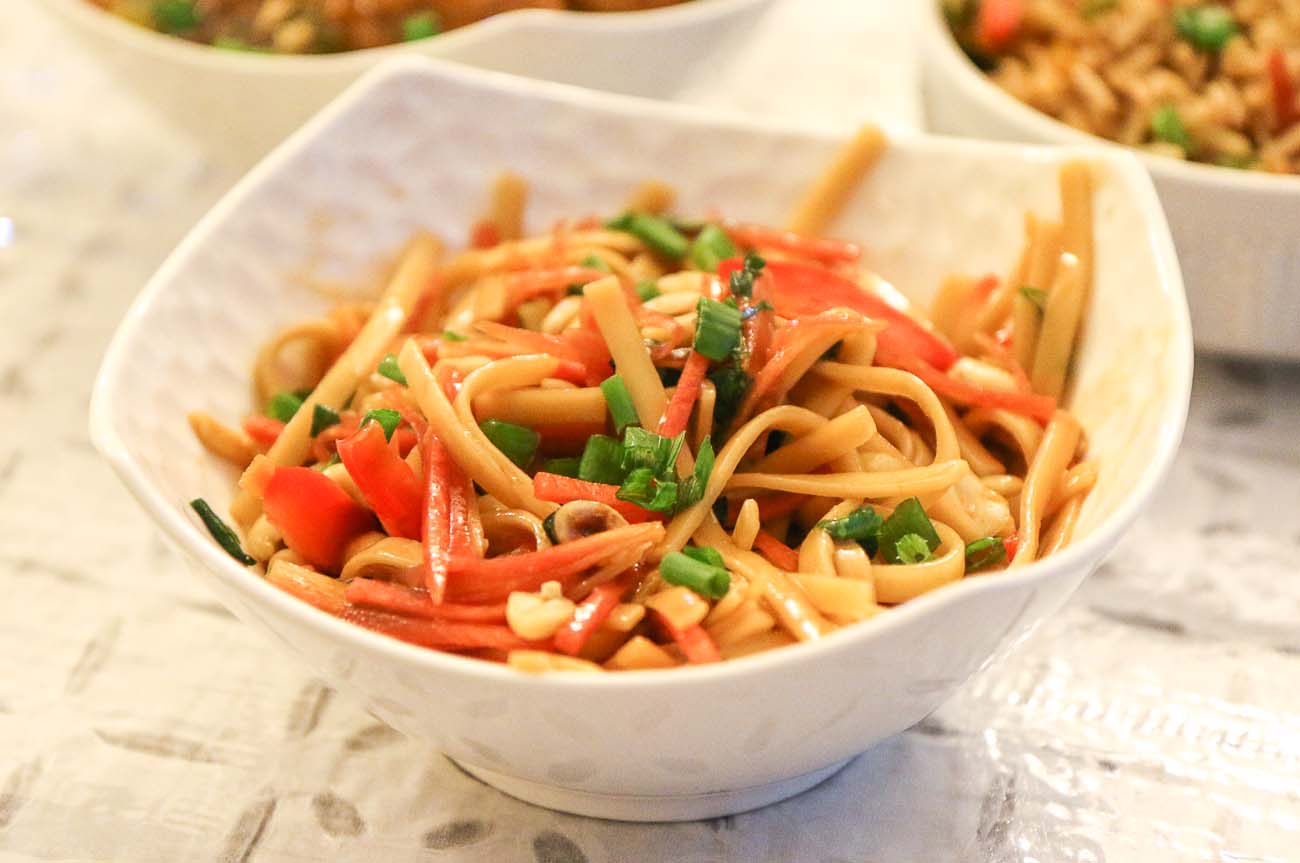 Cold Asian Noodle Salad Flavoured With Peanuts And Sesame