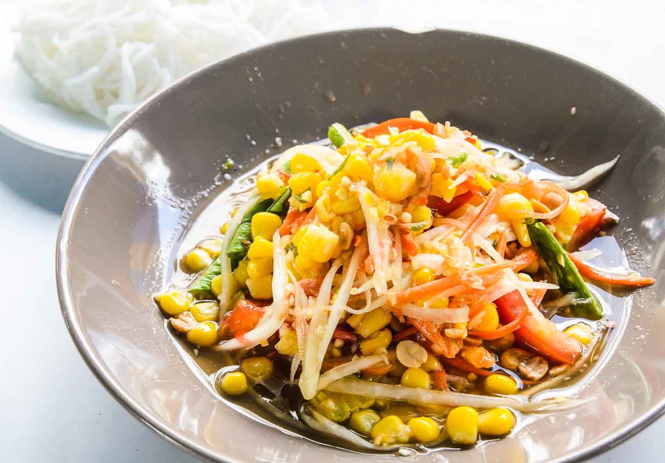 Thai Spicy Green Papaya Salad Recipe With Sweet Corn - Som Tum Khao Pod Thai Spicy Green Papaya Salad Recipe With Sweet Corn - Som Tum Khao Pod