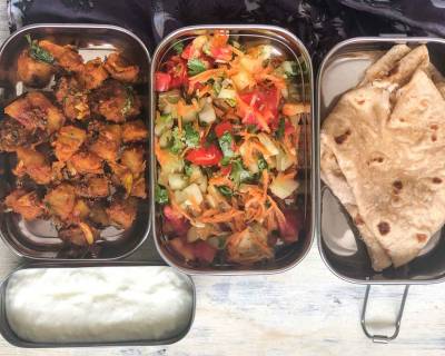 Kids Lunch Box: Patiala Aloo, Carrot Cucumber Tomato Salad And Phulka