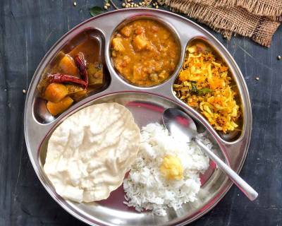 Portion Control Meal Plate: Vegetable Sambar, Manga Pachadi, Cabbage Carrot Thoran And Steamed Rice