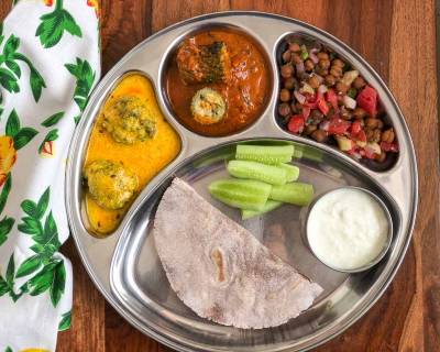 Portion Control Meal Plate: Kadhi Pakora, Karela Masala, Ragi Roti, Salad And Curd