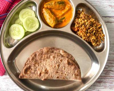 Portion Control Meal Plate- No Onion No Garlic Parwal Masala, Horse Gram Sprouts Thoran, Ragi Roti & Cucumbers
