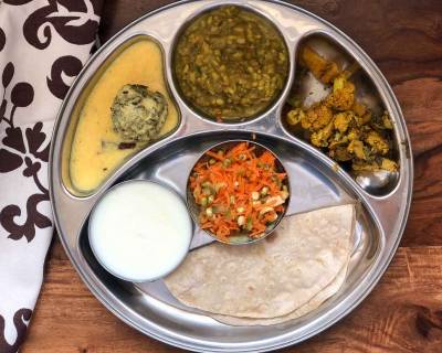 Portion Control Meal Plate : Methi Pakoda Kadhi, Moong Dal, Aloo Gobi Sabzi And Phulka