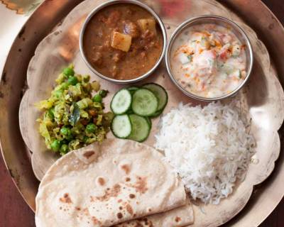 Everyday Meal Plate: Ellu Kuzhambu, Cabbage Thoran, Phulka & Tadka Raita  