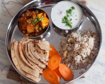 Everyday Meal Plate: Vegetable Curry, Lachha Paratha, Jeera Rice & Raita