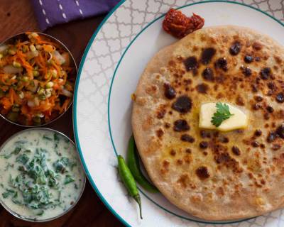 Breakfast Meal Plate: Stuffed Aloo Paratha, Palak Raita, Carrot Salad
