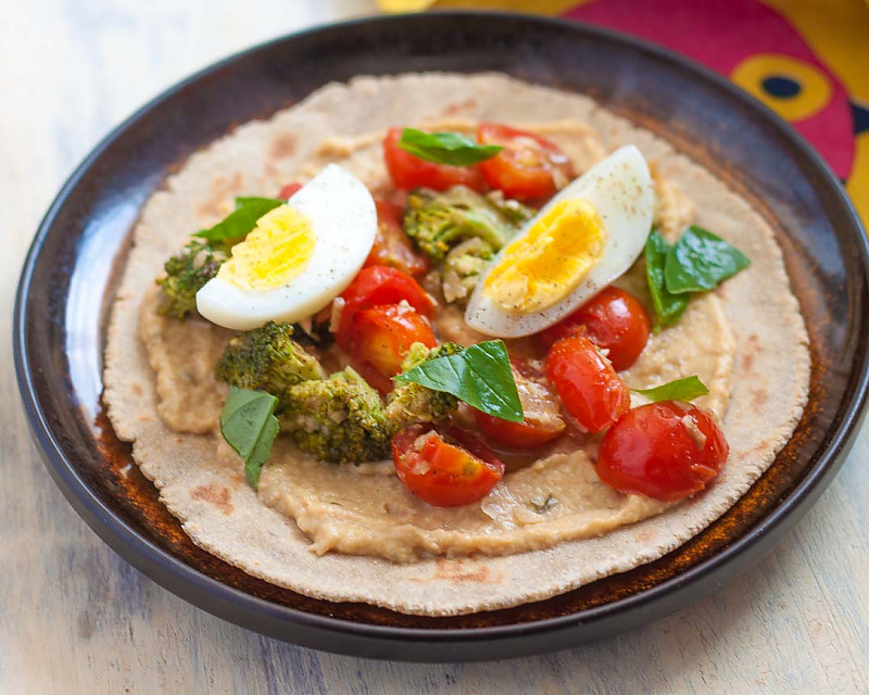 Soft Millet Taco Recipe Topped With Hummus & Veggies