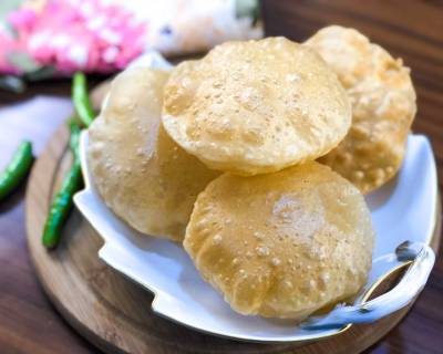 Puri Recipe - Learn to Make Soft Puffed Puris At Home