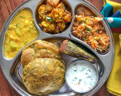 Portion Control Meal Plate : Turai Moong Dal, Bharwa Karela, Aloo Gobi Sabzi And Puri 