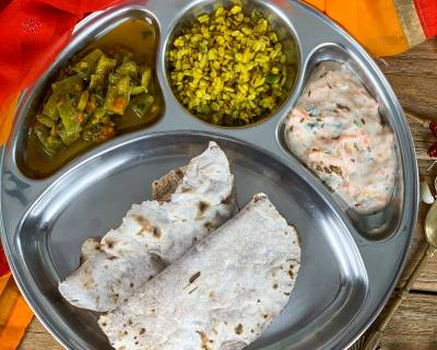 Portion Control Meal Plate : Turai Ki Sabzi, Sukhi Urad Dal, Carrot Raita And Ragi Wheat Phulka