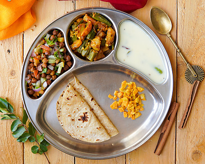 Portion Control Meal Plate: Aloo Bhindi Sabzi, Gujarati Kadhi, Kala Chana Salad and Amla Pickle 