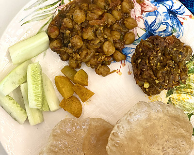 Rajasthani Feast: Jaisalmer Chole, Baingan Bharta, Amla Pickle, Puri, Salad and Shrikand with Mangoes