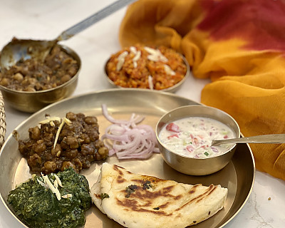 Dinner Recipes | Dinner Ideas - Amritsari Chole, Sarson Ka Saag, Gajjar Halwa, Kulcha, Lacha Pyaz, Boondi Raita