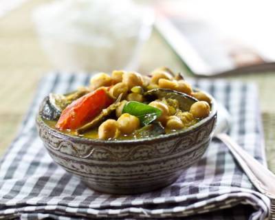 Roasted Eggplant And Chickpea Curry Flavored With Curry Leaves And Mustard Seeds