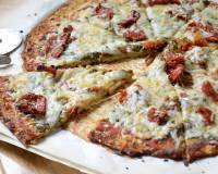 Cauliflower Crust Pizza With Pesto, Sundried Tomatoes & Goat Cheese