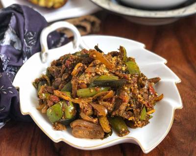 Kathirikai Poondu Pirattal Recipe - South Indian Style Brinjal Stir Fry With Garlic