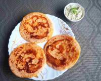 Spicy Tomato Uttapam With Garlic Recipe