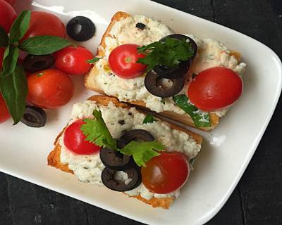 Italian Ricotta Crostini with Olives and Cherry Tomatoes Recipe