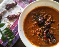 Pavakka Theeyal Recipe - Spicy & Tangy Karela In Tamarind Gravy
